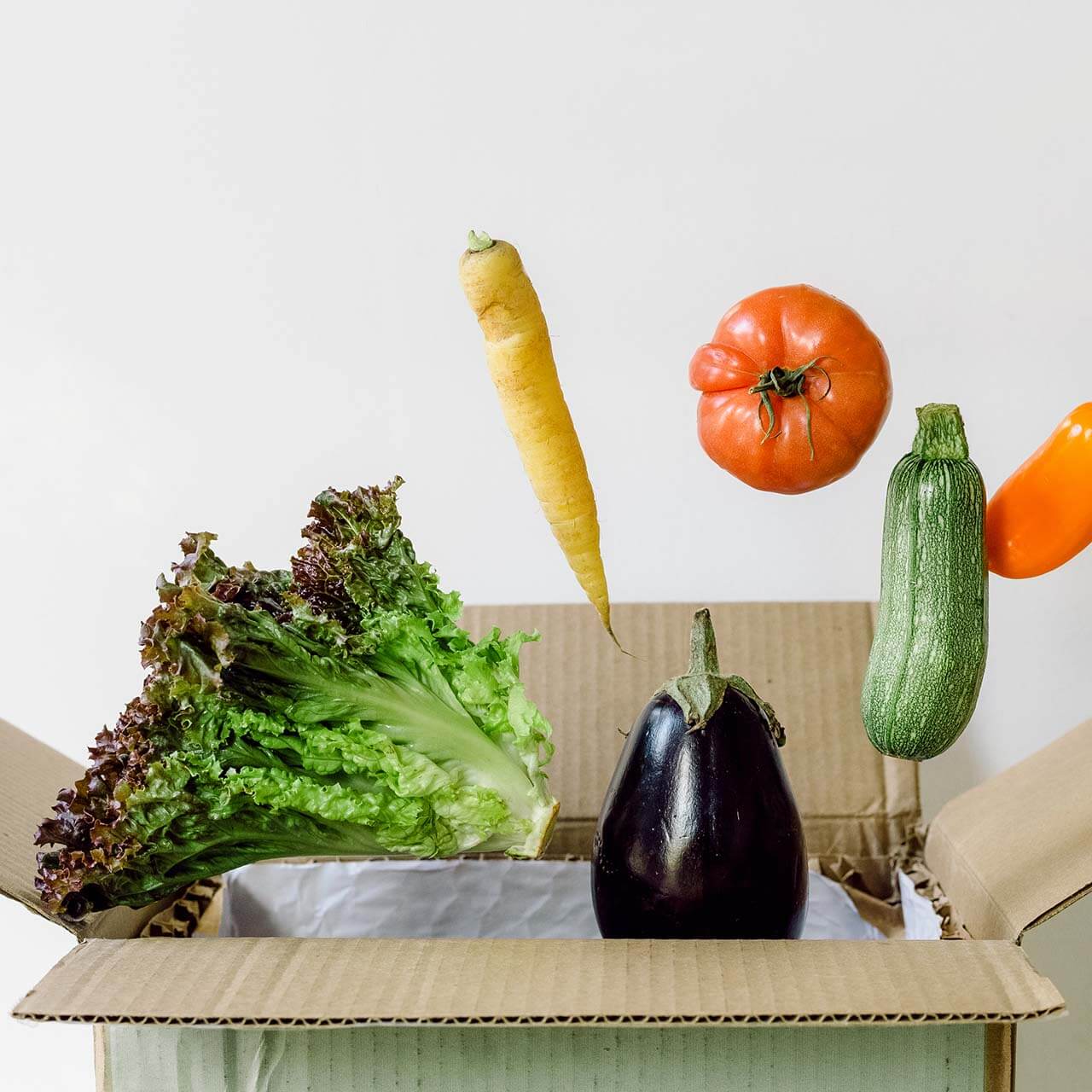 Man using a laptop in a restaurant